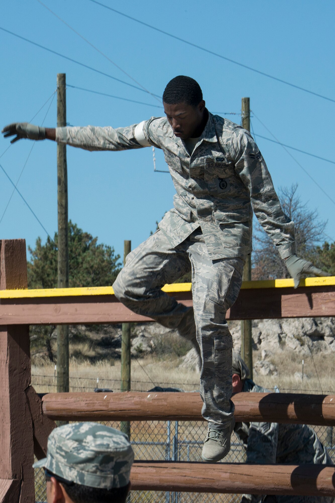 U.S. Air Force Airman First Class Michael James, 307th Security Forces Squadron, jumps from an obstacle during the Mental and Physical competition of the Global Strike Challenge, Sept. 25, 2014, Camp Guernsey, Wyo. The Global Strike Challenge is the world's premier bomber, Intercontinental Ballistic Missile, helicopter operations and security forces competition with units from Air Force Global Strike Command, Air Combat Command, Air Force Reserve Command and the Air National Guard. (U.S. Air Force photo by Master Sgt. Greg Steele/Released)
