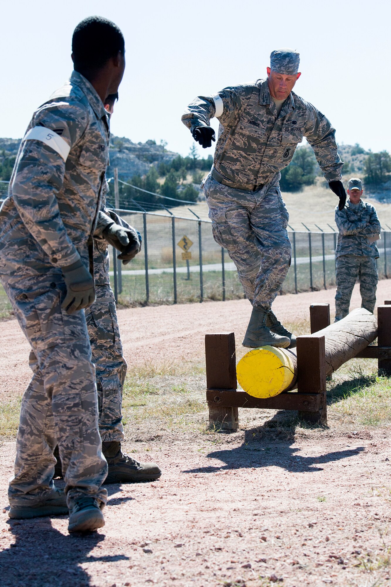 U.S. Air Force Staff Sgt. Randy Patrick, 307th Security Forces Squadron, tries to balance himself during the Mental and Physical competition during the Global Strike Challenge, Sept. 25, 2014, Camp Guernsey, Wyo. The Global Strike Challenge is the world's premier bomber, Intercontinental Ballistic Missile, helicopter operations and security forces competition with units from Air Force Global Strike Command, Air Combat Command, Air Force Reserve Command and the Air National Guard. (U.S. Air Force photo by Master Sgt. Greg Steele/Released)