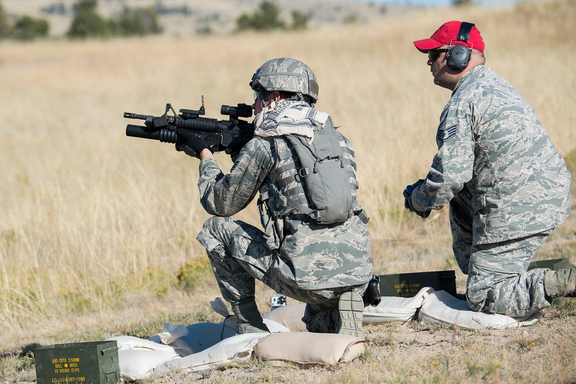 U.S. Air Force Senior Airman Clint Melancom, 307th Security Forces Squadron, prepares to fire an M203 grenade launcher during the Global Strike Challenge Weapons Firing competition, Sept. 24, 2014, Camp Guernsey, Wyo. The Global Strike Challenge is the world's premier bomber, Intercontinental Ballistic Missile, helicopter operations and security forces competition with units from Air Force Global Strike Command, Air Combat Command, Air Force Reserve Command and the Air National Guard. (U.S. Air Force photo by Master Sgt. Greg Steele/Released)