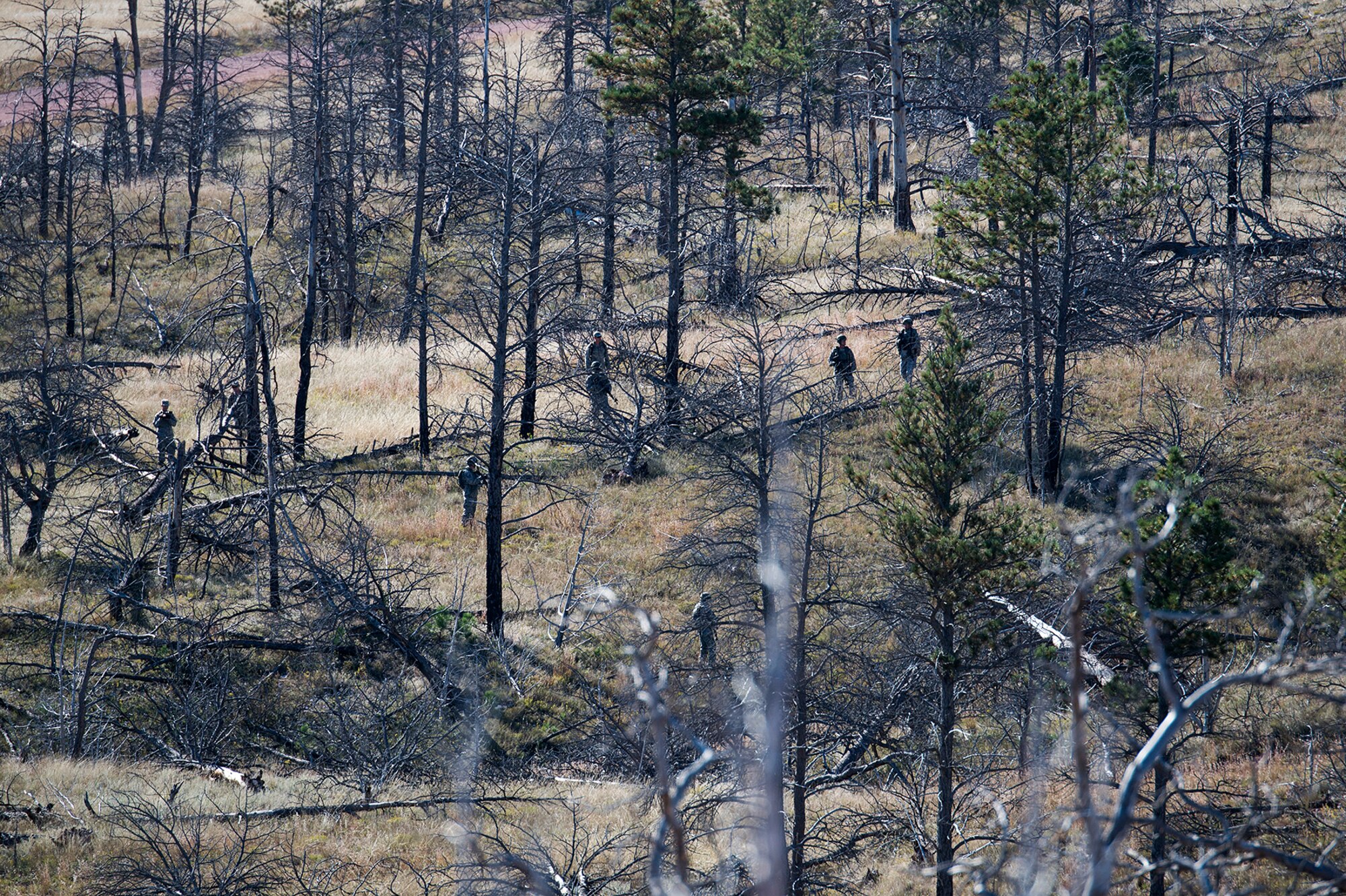 Members of the 307th Security Forces Squadron competition team participate in a tactics scenario during the Global Strike Challenge, Sept. 23, Camp Guernsey, Wyo. The Global Strike Challenge is the world's premier bomber, Intercontinental Ballistic Missile, helicopter operations and security forces competition with units from Air Force Global Strike Command, Air Combat Command, Air Force Reserve Command and the Air National Guard. (U.S. Air Force photo by Master Sgt. Greg Steele/Released)