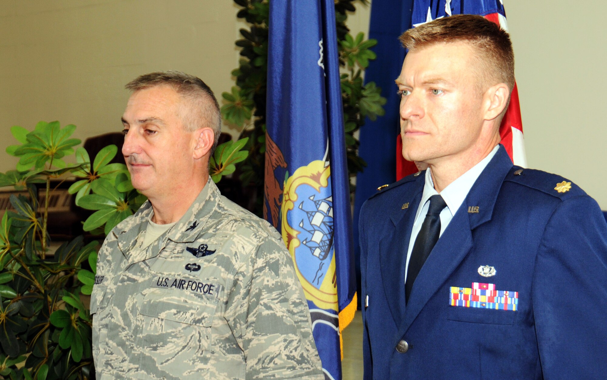 The 111th Attack Wing commander Col. Howard "Chip" Eissler stands near newly-promoted Lt. Col. Richard Younts, base legal office, during Younts's promotion ceremony, Horsham Air Guard Station, Pa., Oct. 4, 2014. Younts had family, friends and fellow military members present during the event. (U.S. Air Force photo by Master Sgt. Chris Botzum/Released) 