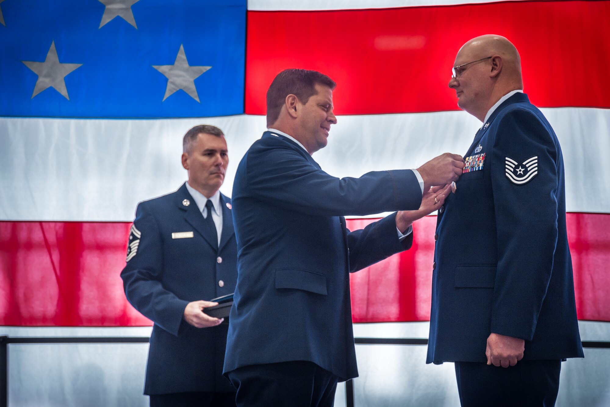 Lt. Col. Marvin Schaitel, 934th Maintenance Group deputy commander, presents Tech. Sgt. David Cadry, 934th Maintenance Squadron, with his Meritorious Service Medal during his retirement ceremony today.  TSgt. Cadry retired after 23 years of service during the October Unit Training Assembly weekend at the Minneapolis-St. Paul Air Reserve Station, Minn.  (U.S. Air Force photo by Shannon McKay/Released)