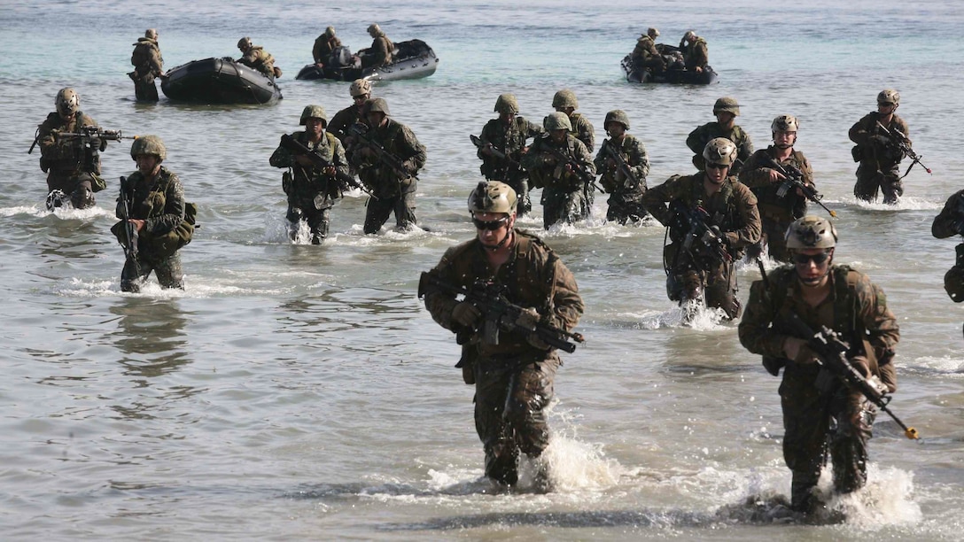 Philippine and U.S. Marines simulate a beach landing from combat rubber raiding crafts onto a small island off the coast of Palawan, Philippines, Oct. 2, 2014 during Amphibious Landing Exercise 2015. The amphibious assault and boat raids were conducted by U.S. Marines to complete a certification exercise being held in conjunction with PHIBLEX 15. PHIBLEX is an annual, bilateral training exercise conducted by the Armed Forces of the Philippines, U.S. Marines and Navy to strengthen interoperability across a range of capabilities, including disaster relief and contingency operations. The AFP Marines are with 12th Marine Battalion, Philippine Marine Corps, and the U.S. Marines are with Battalion Landing Team 3rd Battalion, 5th Marine Regiment, 31st Marine Expeditionary Unit.