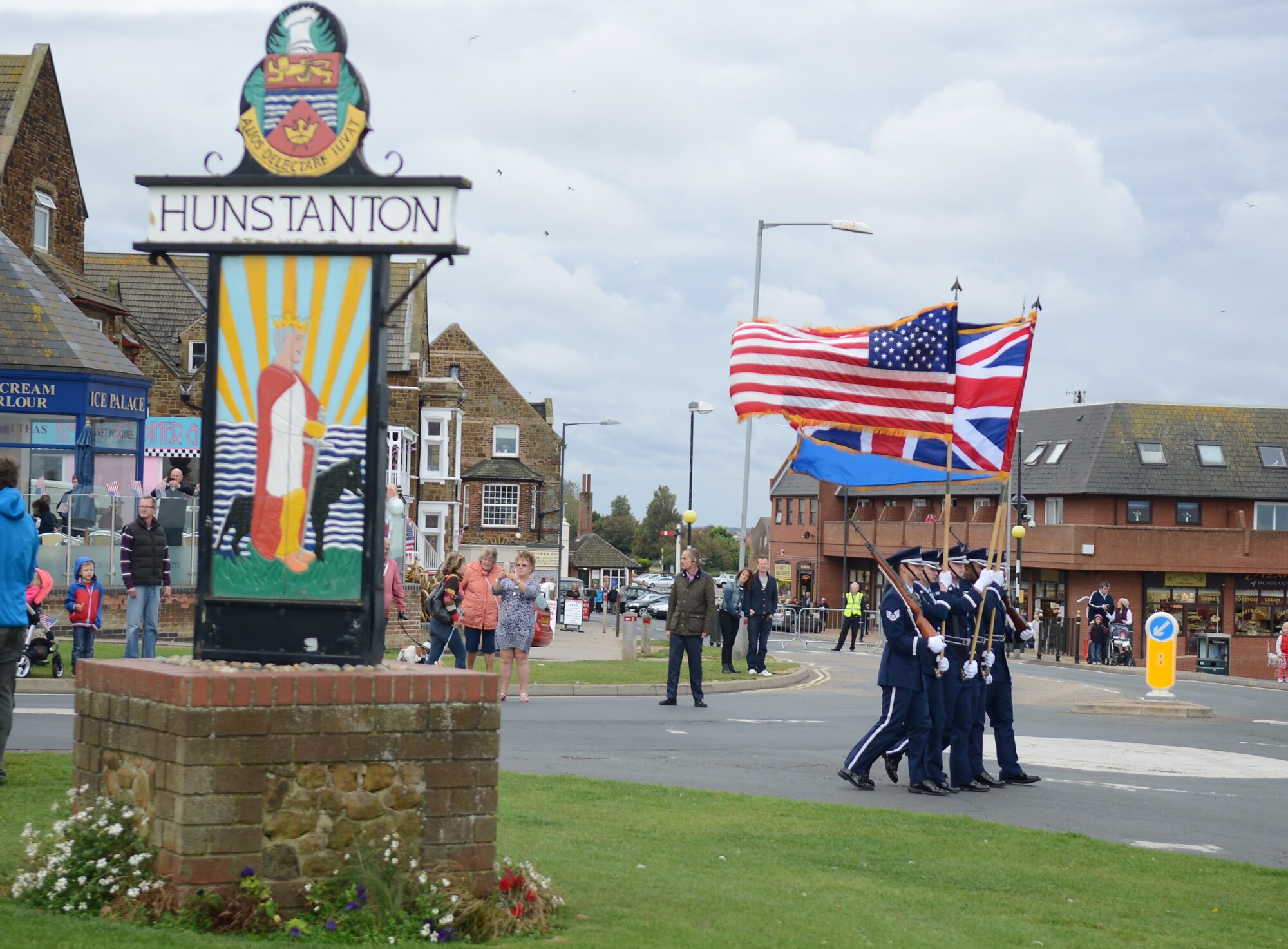 Members of the Team Mildenhall Honor Guard march in a parade Oct. 4, 2014, in Hunstanton, England. The parade commemorated the Airmen who aided the town during a flood in 1953, saving numerous lives. (U.S. Air Force photo/Airman 1st Class Kyla Gifford/Released)
