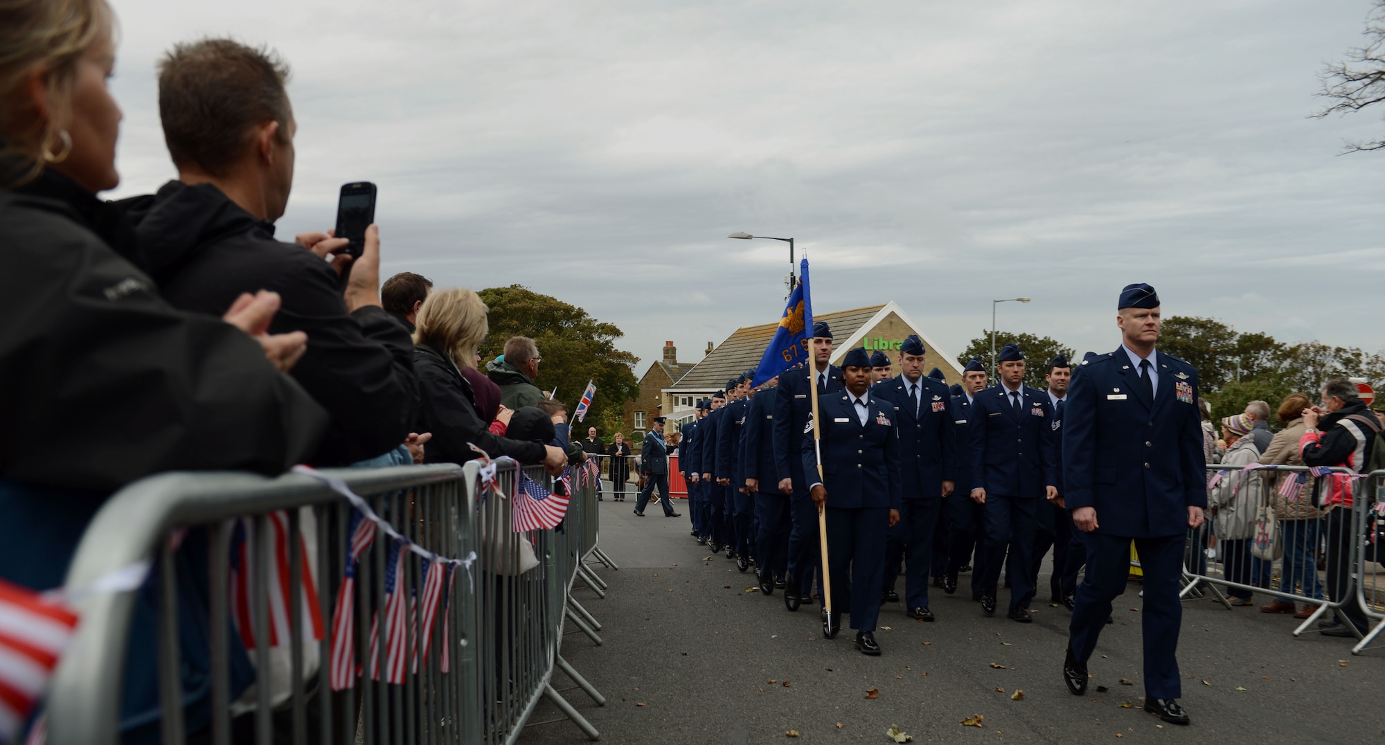 Airmen from the 67th Special Operations Squadron march in a parade Oct. 4, 2014, in Hunstanton, England. The parade commemorated the Airmen who aided the town during a flood in 1953, saving numerous lives. (U.S. Air Force photo/Airman 1st Class Preston Webb/Released)