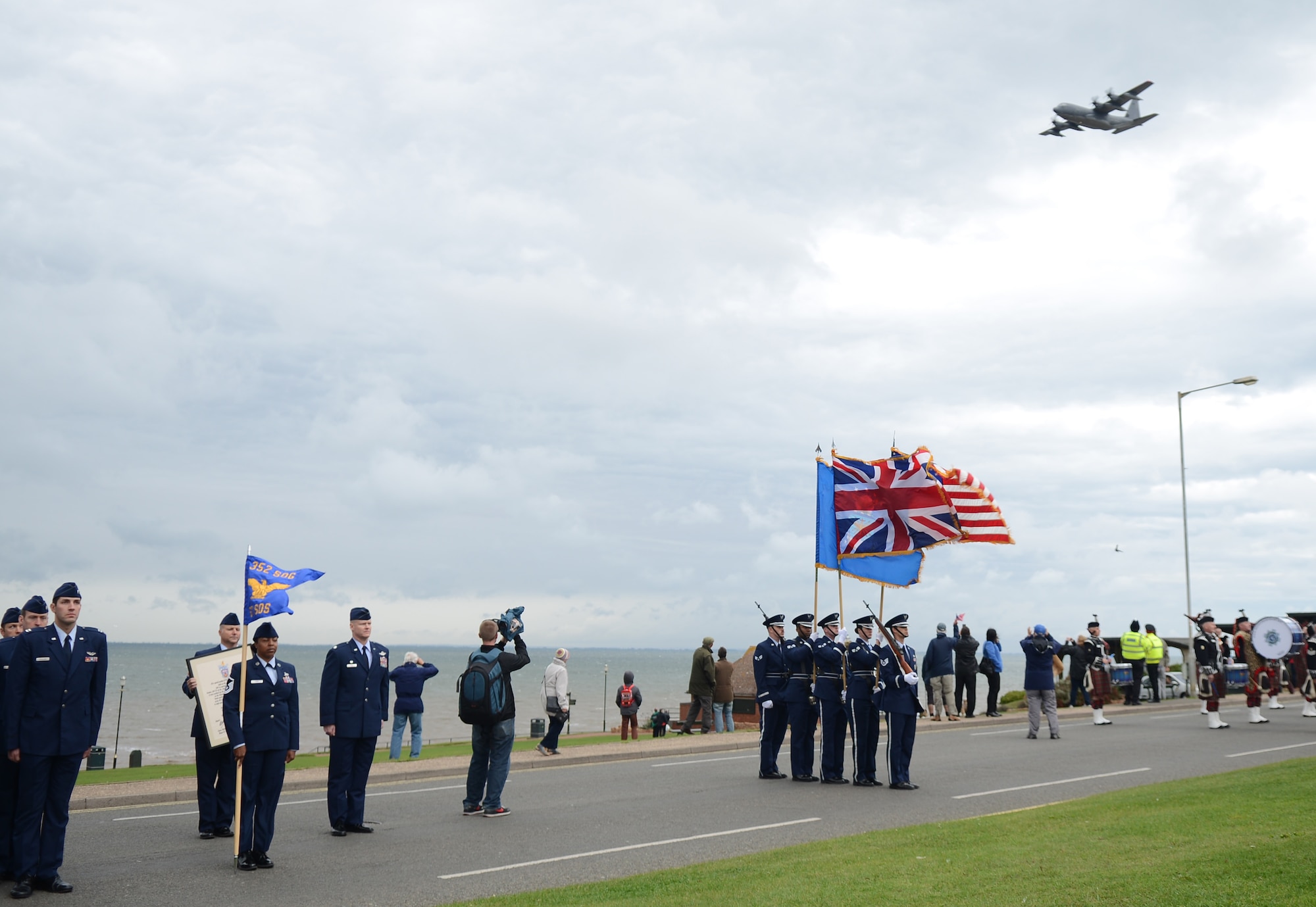 An MC-130J Commando II flies over a ceremony granting the 67th Special Operations Squadron the Freedom of Hunstanton, the highest honor the town of Hunstanton is able to award, Oct. 4, 2014, at Hunstanton, England. This is the second time that a U.S. Air Force squadron has been granted the freedom of a British town. (U.S. Air Force photo/Airman 1st Class Kyla Gifford/Released)