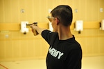 Army athlete Erin Stewart competes in the pistol shooting competition during the 2014 Warrior Games in Colorado Springs, Colo. Oct. 3, 2014. The Warrior Games consists of  200 wounded, ill and injured service members athletes from throughout the Department Of Defense, who compete in paralympic style events for their respective military branch. 