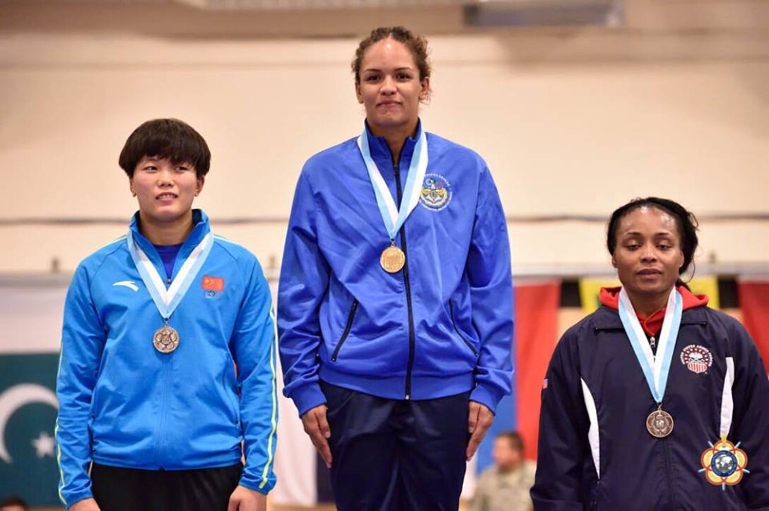 Iris Smith (Right) wins the bronze medal in the Women's Freestyle 75kg competition at the 29th CISM World Military Wrestling Championship at Joint Base McGuire-Dix-Lakehurst, New Jersey 1-8 October 2014.

Gold - Aline da Silva Ferreira (Brazil)
Silver - Liping Jia (China)
Bronze - Iris Smith (USA)