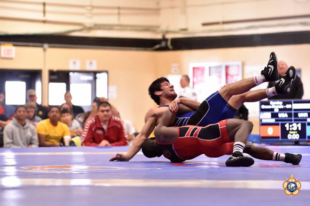 Army Sgt. Spencer Mango during the 59 kg Greco-Roman competition at the 29th CISM World Military Wrestling Championship at Joint Base McGuire-Dix-Lakehurst, NJ 1-8 October 2014.