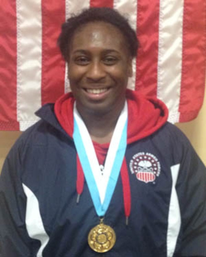 Army Sgt. Randi Miller Strike Gold in the Women's Freestyle 69kg competition at the 29th CISM World Military Wrestling Championship at Joint Base McGuire-Dix-Lakehurst, New Jersey 1-8 October 2014