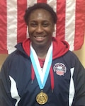 Army Sgt. Randi Miller Strike Gold in the Women's Freestyle 69kg competition at the 29th CISM World Military Wrestling Championship at Joint Base McGuire-Dix-Lakehurst, New Jersey 1-8 October 2014