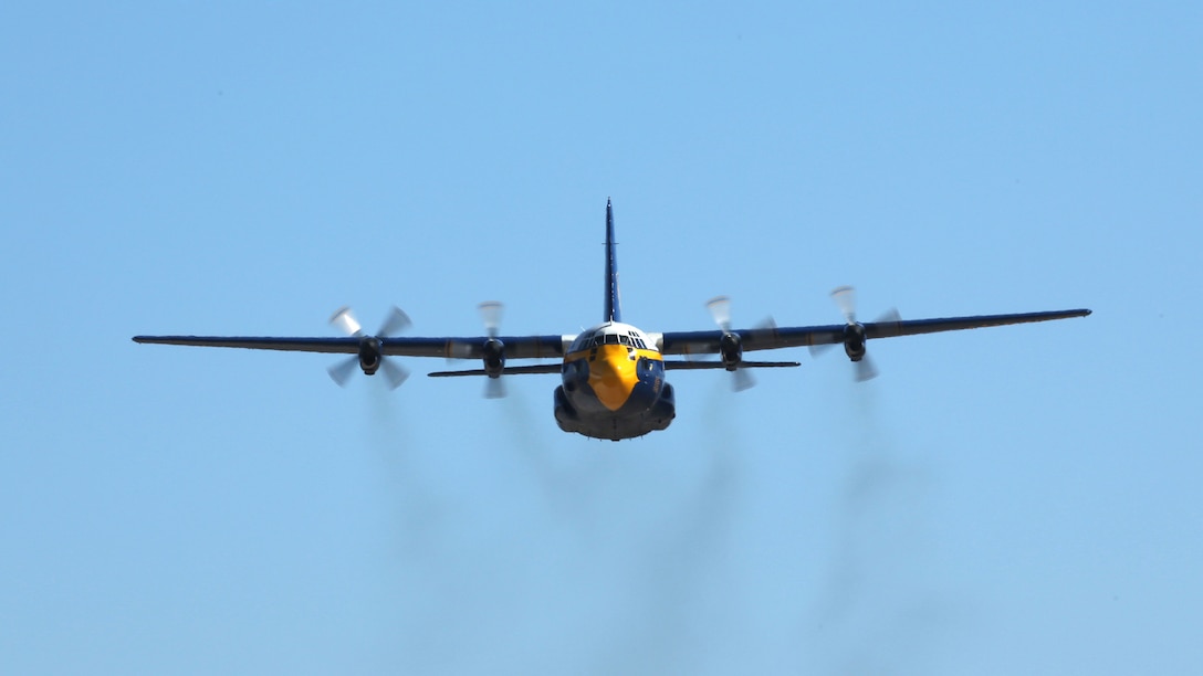 The Navy Blue Angels C-130 flies in for thousands of people during the 2014 Marine Corps Air Station Miramar Air Show, Oct. 3. The C-130 is known as "Fat Albert" and is flown by an all-Marine crew.