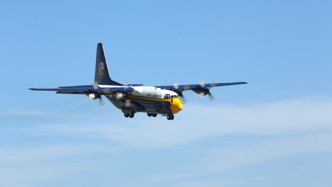 The Navy Blue Angels C-130 flies in for thousands of people during the 2014 Marine Corps Air Station Miramar Air Show, Oct. 3. The C-130 is known as "Fat Albert" and is flown by an all-Marine crew.