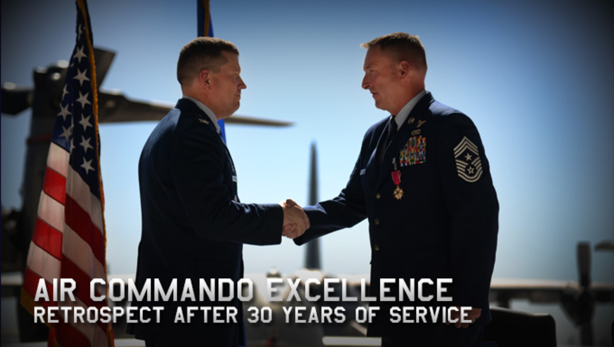 U.S. Air Force Col. Tony Bauernfeind, 27th Special Operations Wing commander, shakes hands with retired Chief Master Sgt. Paul Henderson, former 27 SOW command chief, during Henderson’s retirement ceremony Oct. 3, 2014 at Cannon Air Force Base, N.M. Henderson dedicated 30 years of honorable service to the United States Air Force. (U.S. Air Force photo/Airman 1st Class Chip Slack)  