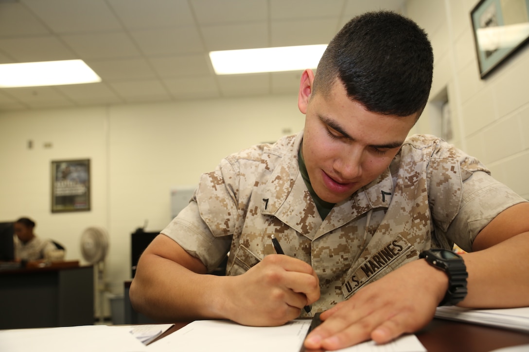 Pfc. Pablo Zacari, administrative clerk with 9th Marine Corps District works
on a submission to the unit diary, Oct. 6, 2014. Zacari is proud of what he
does in the Marine Corps and plays a vital role in the administrative
support of the district headquarters.
