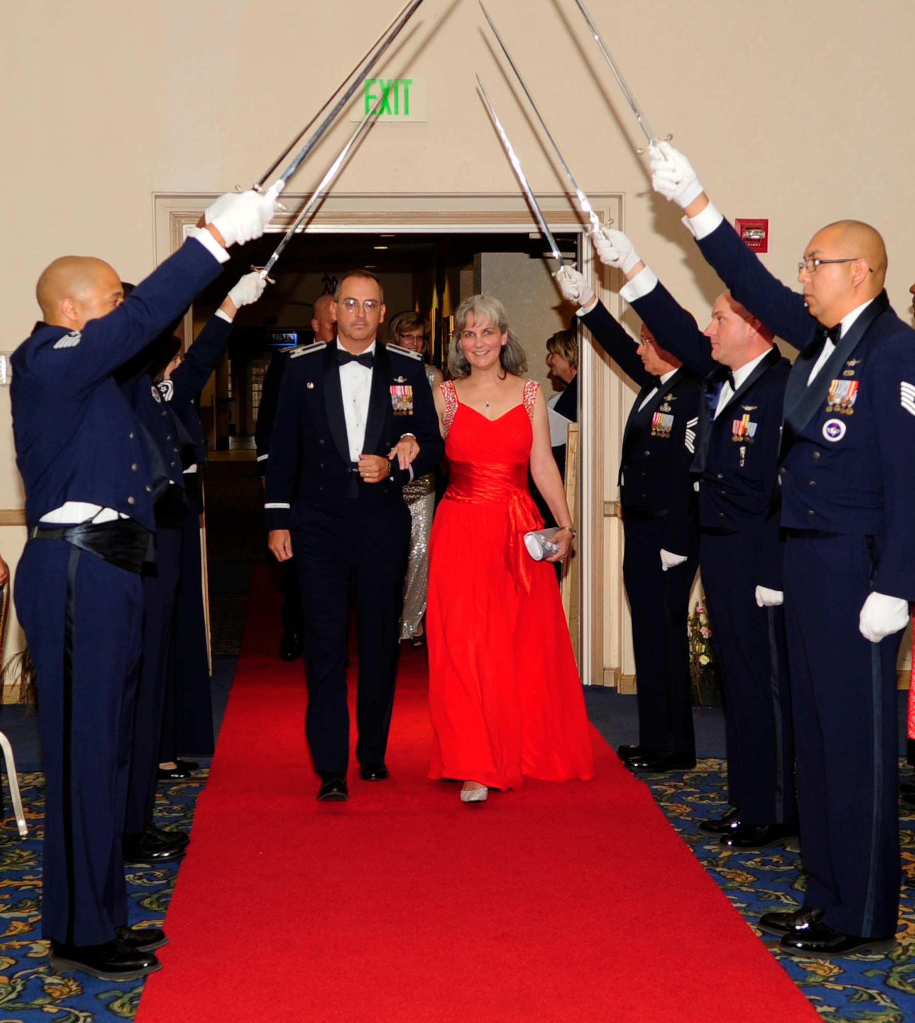 Col. Keith Balts, 30th Space Wing commander and his wife Christine, enter the Pacific Coast Club ballroom during an Air Force ball Oct. 3, 2014, Vandenberg Air Force Base. Celebrating decades of air superiority, the theme of this year’s event was “Airmen of the Central Coast”, which aimed to highlight Airmen currently situated in the central coast region of California, while building camaraderie and preserving Air Force heritage. (U.S. Air Force Photo by Senior Airman Shane Phipps/Released)