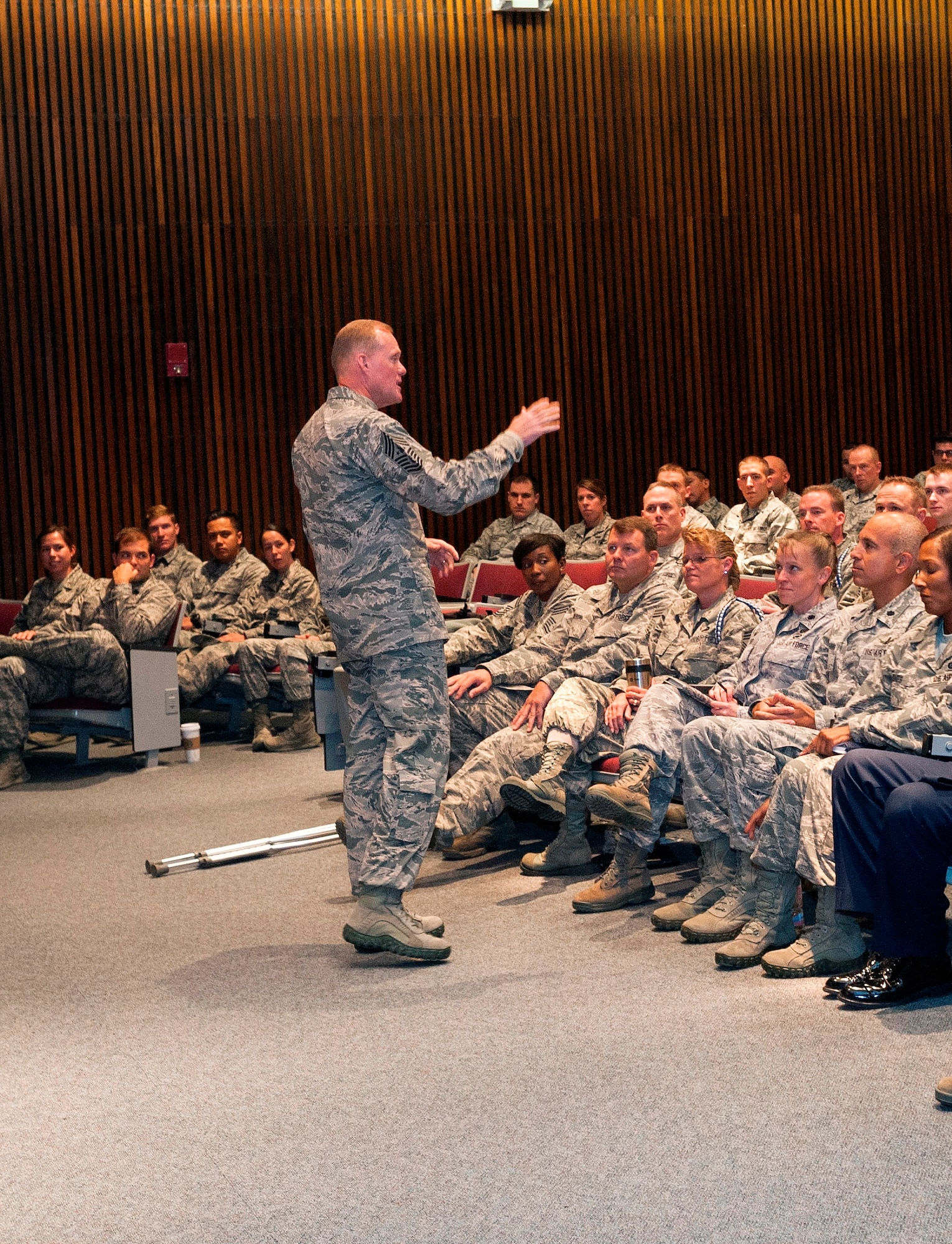 Chief Master Sgt. of the Air Force James A. Cody speaks to Academy Airmen at the base theatre here Oct. 3. The chief hosted an all call for the Academy's force to thank them for day-to-day efforts to accomplish the mission. He also discussed changes to the enlisted evaluation system and other topics of concern. (U.S. Air Force photo/Liz Copan)