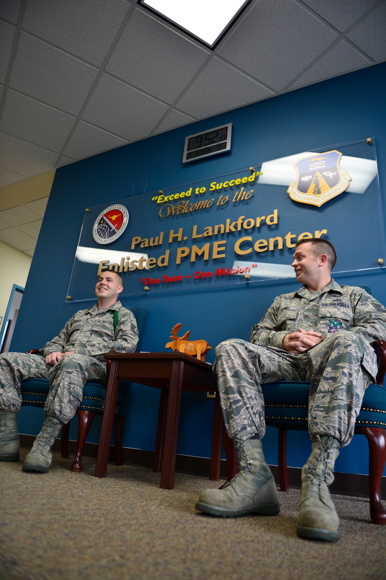 MCGHEE TYSON AIR NATIONAL GUARD BASE, Tenn.  - Tech. Sgt. Bryan Johnson and Tech. Sgt. David Ferris talk outside the Commandant's Office here Oct. 6, 2014, at the I.G. Brown Training and Education Center. Both Airmen were attending NCO Academy and they competed for the Commandant's Award. (U.S. Air National Guard photo by Master Sgt. Mike R. Smith/Released)