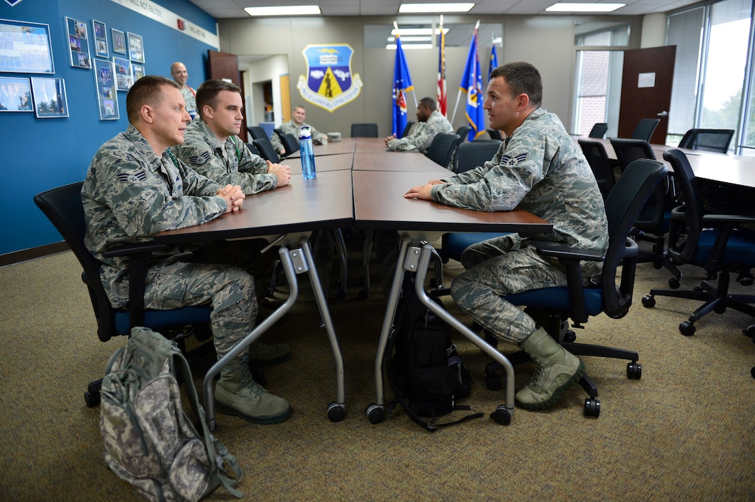 MCGHEE TYSON AIR NATIONAL GUARD BASE, Tenn.  - Airman Leadership School nominees for the Paul H. Lankford Enlisted PME Center's Leadership Award wait outside the Commandant's office here Oct. 6, 2014, at the I.G. Brown Training and Education Center for their interviews. From left, Senior Airman Forrest Leach, Staff Sgt. Michael Minahan and Senior Airman Ryan Campbell. (U.S. Air National Guard photo by Master Sgt. Mike R. Smith/Released)