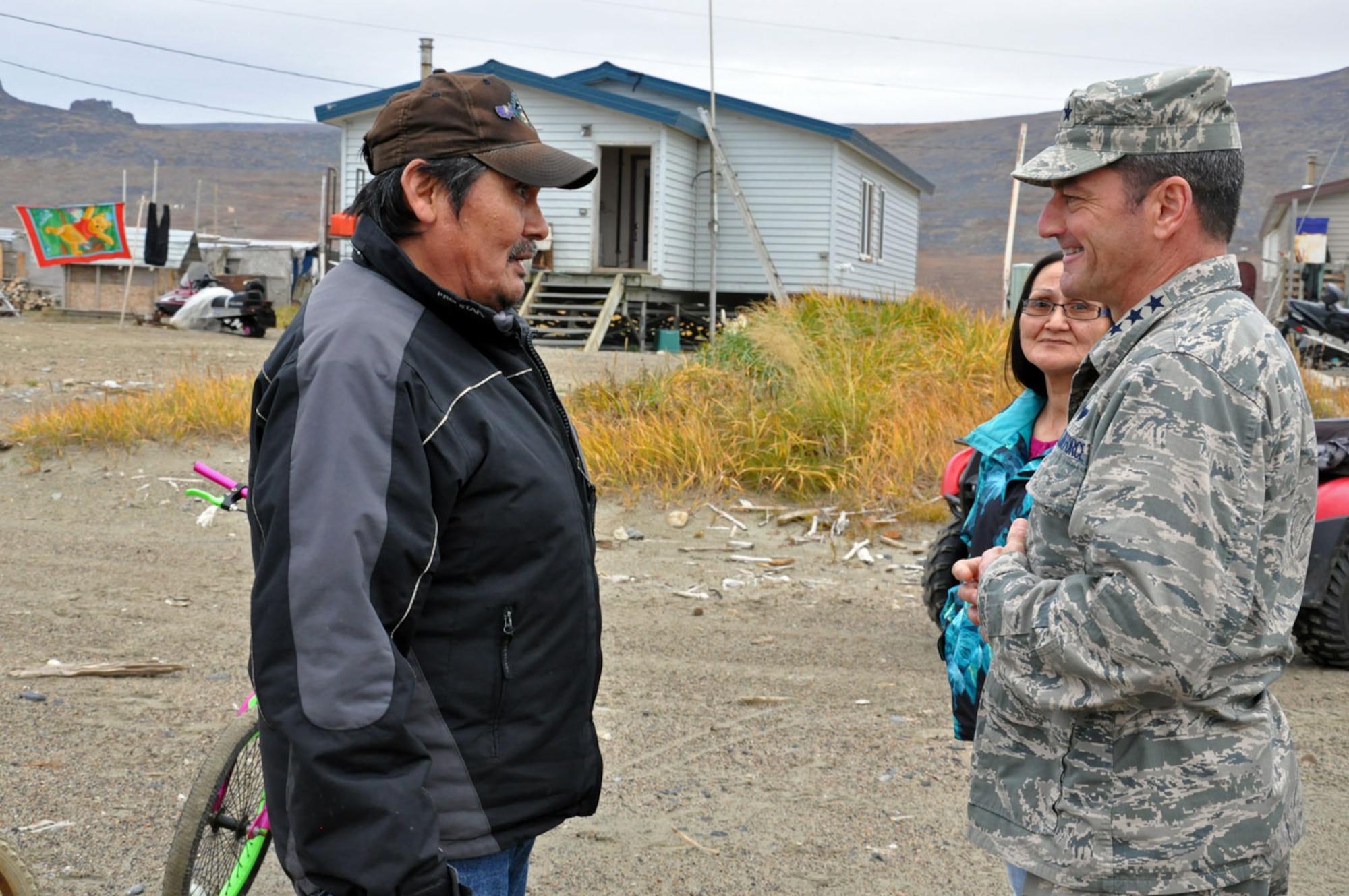 U.S. Air Force Lt. Gen. Russell Handy, Alaskan Command commander, meets with Frank Oxereok, a resident of the 160-person Native Village of Wales during a trip to western Alaska October 1, 2014. Alaskan Command leadership was able to gain insight on the life and challenges of Alaska Native Tribes and tour and meet with the residents of the native villages of Wales and Shishmaref as well as the Nome Eskimo Community. (U.S. Air Force photo/Capt. Anastasia Wasem)