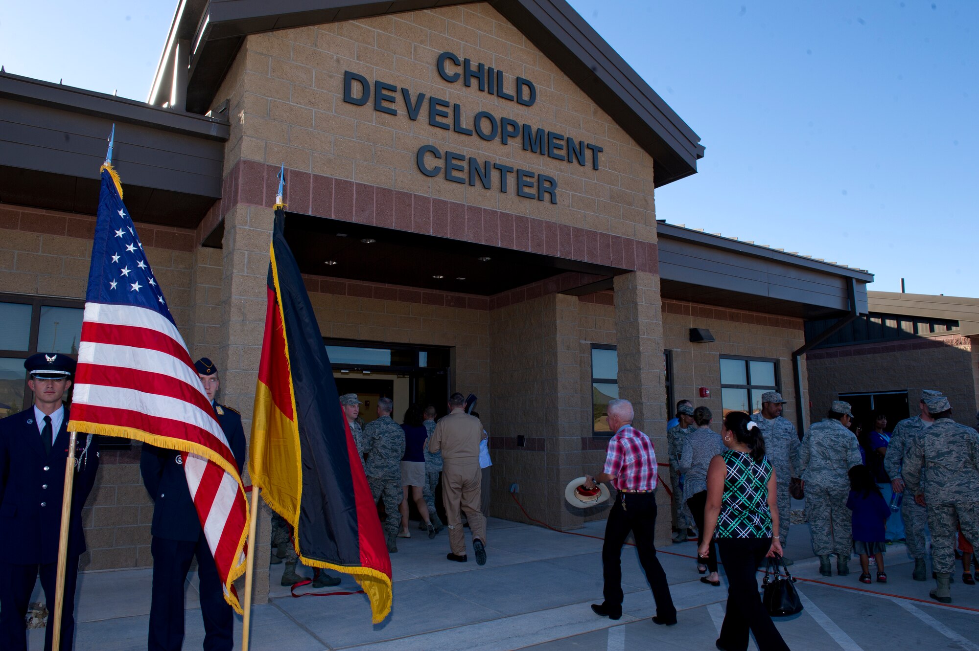Members of Team Holloman are invited to walk the halls and tour the inside of the new Child Development Center at Holloman Air Force Base, N.M. Oct. 1. Planning began in 2004 when Mrs. Susan Misener, 49th Mission Support Group deputy commander, and Mrs. Carol Ward, Airman and Family Services flight chief, took on the project. Initial plans involved renovations in 2009, but ended after eight months when contaminated soil was discovered due to an underground storage site. (U.S. Air Force photo by Staff Sgt. E’Lysia Wray/Released)