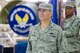 Col. Peter Nezamis, Commander of the 126th Air Refueling Wing accepts the Air Force Oustanding Unit Award on behalf of the 126 ARW while Command Chief Master Sgt. Karen Stevens holds the Wing flag at Scott Air Force Base, Saturday, Oct. 4, 2014. The Illinois Air National Guard unit received the award for distinguishing itself for exceptionally meritorious service from Oct. 1, 2011 to Sept. 30, 2013. (Air National Guard photo by Master Sgt. Ken Stephens)