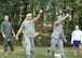 Members of the 80th Aerial Port Squadron participate in a water balloon toss at their unit combat dining in Oct. 4, 2014, at Dobbins Air Reserve Base, Ga. The celebration allows Airmen of all ranks to come together and celebrate unit and individual accomplishments. (U.S. Air Force photo by Staff Sgt. Karla Lehman/Released)