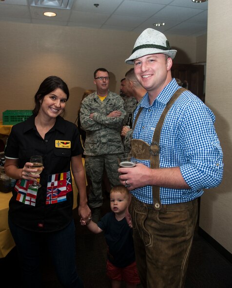 A family poses for a photo during an Oktoberfest event Oct. 3, 2014, at Moody Air Force Base, Ga. The original Oktoberfest, held annually in Munich, Bavaria, Germany is the world’s largest funfair. (U.S. Air Force photo by Senior Airman Jarrod Grammel/Released)
