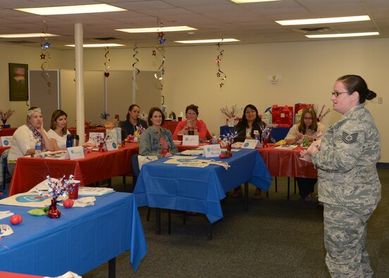 ALTUS AIR FORCE BASE, Okla. – U.S. Air Force Tech. Sgt. Melissa Mantegna, Altus Air Force Base Drug Demand Reduction technician, speaks to Heart Link participants, Oct. 3, 2014. Spouses were informed of the different services and programs by 17 different speakers from the agencies on base. (U.S. Air Force photo by Airman 1st Class Nathan Clark/Released)