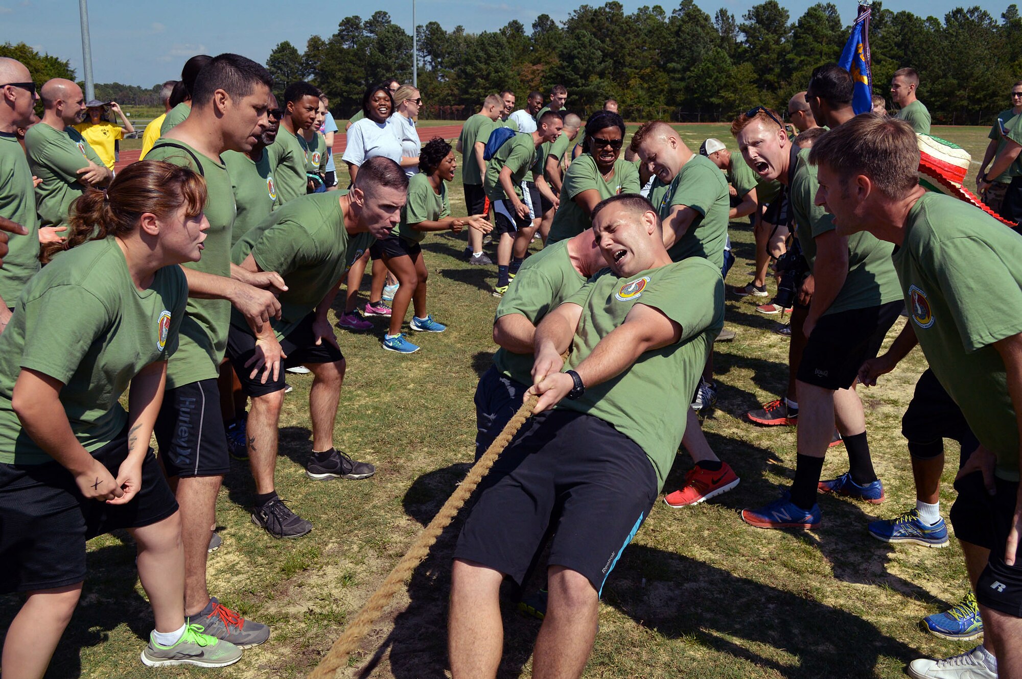 43rd Airlift Group Airmen participate in a Comprehensive Airman Fitness program sports day sponsored by the Air Force Sergeants Association, Chapter 367, on Oct. 3 at Pope Army Airfield, N.C. Activities included track and field events, mushball, softball, walleyball, basketball, dodgeball, tug-o-war, cornhole and a 3-mile ruck march. Squadron teams competed for trophies and the Group’s spirit flag. The 43rd Logistics Readiness Squadron and 43rd Force Support Squadron combined efforts to win 1st place overall and the Group’s spirit flag. (U.S. Air Force photo/Marvin Krause)