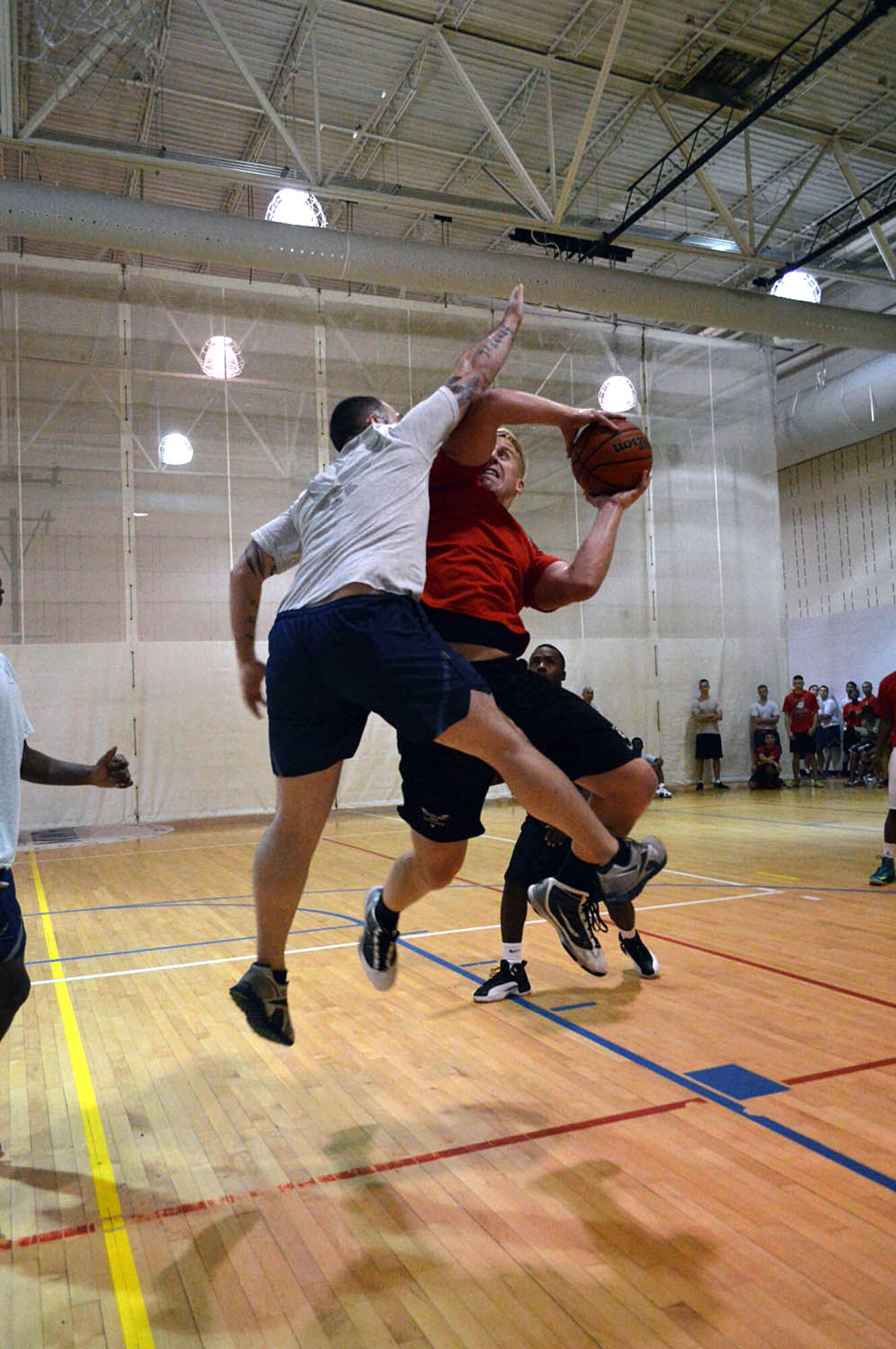 43rd Airlift Group Airmen participate in a Comprehensive Airman Fitness program sports day sponsored by the Air Force Sergeants Association, Chapter 367, on Oct. 3 at Pope Army Airfield, N.C. Activities included track and field events, mushball, softball, walleyball, basketball, dodgeball, tug-o-war, cornhole and a 3-mile ruck march. Squadron teams competed for trophies and the Group’s spirit flag. The 43rd Logistics Readiness Squadron and 43rd Force Support Squadron combined efforts to win 1st place overall and the Group’s spirit flag. (U.S. Air Force photo/Marvin Krause)