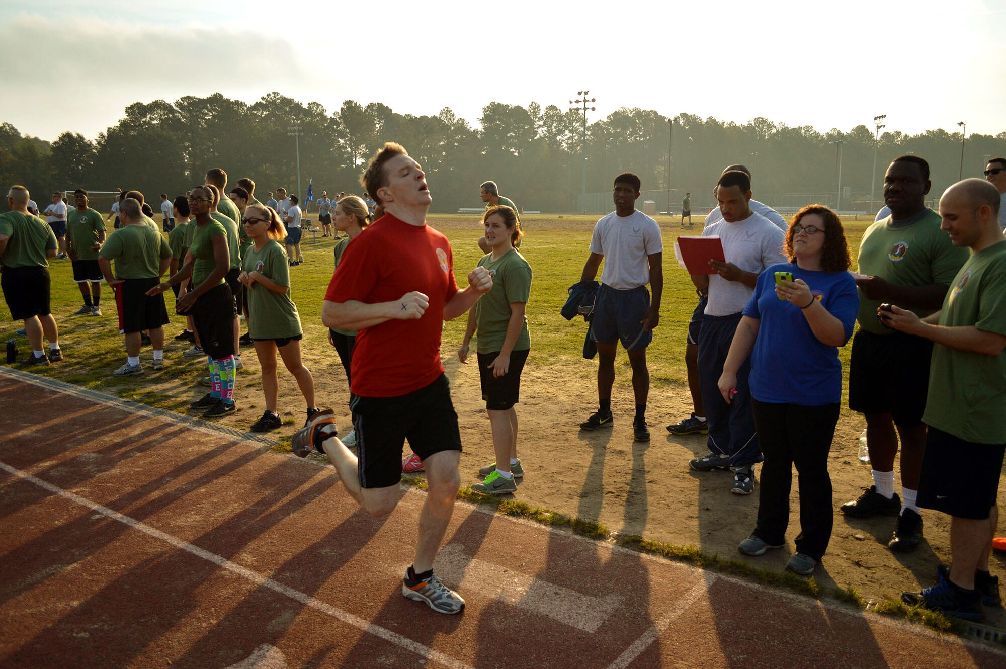 43rd Airlift Group Airmen participate in a Comprehensive Airman Fitness program sports day sponsored by the Air Force Sergeants Association, Chapter 367, on Oct. 3 at Pope Army Airfield, N.C. Activities included track and field events, mushball, softball, walleyball, basketball, dodgeball, tug-o-war, cornhole and a 3-mile ruck march. Squadron teams competed for trophies and the Group’s spirit flag. The 43rd Logistics Readiness Squadron and 43rd Force Support Squadron combined efforts to win 1st place overall and the Group’s spirit flag. (U.S. Air Force photo/Marvin Krause)