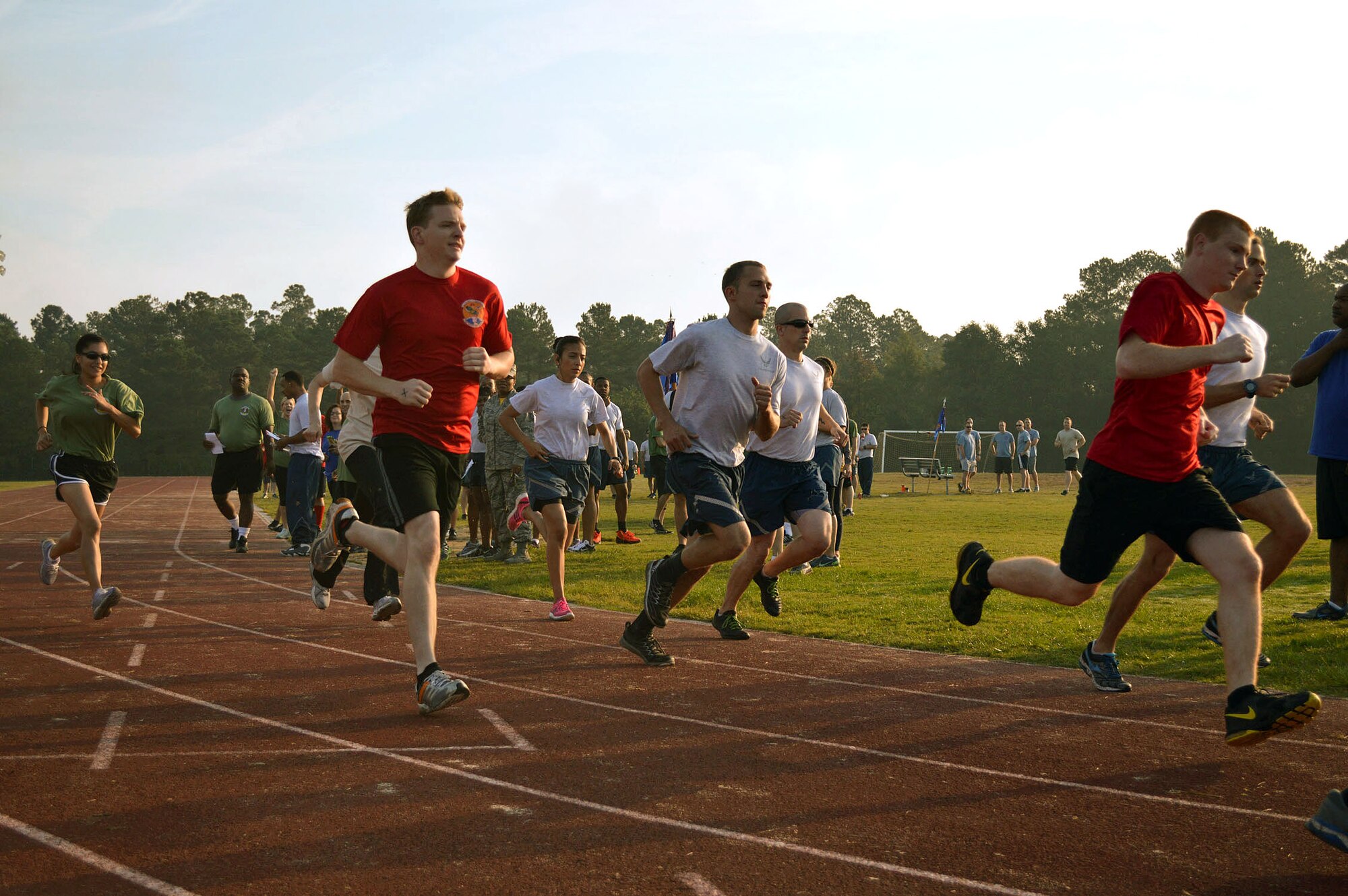 43rd Airlift Group Airmen participate in a Comprehensive Airman Fitness sports day sponsored by the Air Force Sergeants Association, Chapter 367, on Oct. 3 at Pope Army Airfield, N.C. Activities included track and field events, mushball, softball, walleyball, basketball, dodgeball, tug-o-war, cornhole and a 3-mile ruck march. Squadron teams competed for trophies and the Group’s spirit flag. The 43rd Logistics Readiness Squadron and 43rd Force Support Squadron combined efforts to win 1st place overall and the Group’s spirit flag. (U.S. Air Force photo/Marvin Krause)