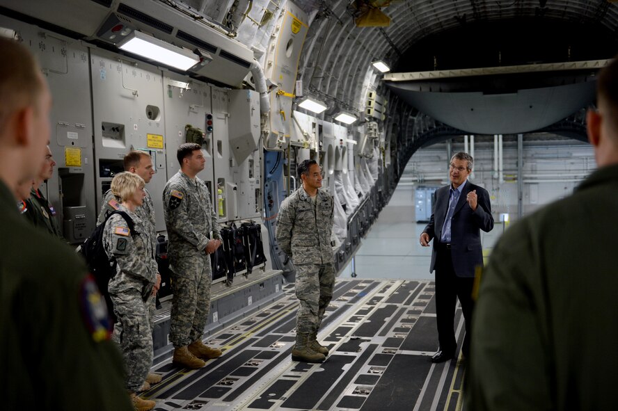 The Honorable Alan Estevez (right), Principal Deputy Under Secretary of Defense Acquisition, Technology and Logistics, shares some of his thoughts about the military with service members Oct. 3, 2014, during his visit at Joint Base Lewis-McChord, Wash. Estevez spoke about the constant changes in the military and emphasized the importance of all McChord’s ongoing operations around the world. (U.S. Air Force photo/Airman 1st Class Keoni Chavarria)