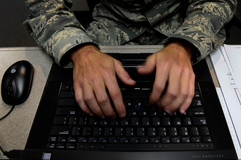 Tech. Sgt. Brad Davis, 119th Command and Control Squadron system administrator, types on a laptop during a Network War Bridge Course conducted by the 39th Information Operations Squadron, Hurlburt Field, Fla., Sept. 19, 2014.  Student’s practice hacking into simulated networks to better understand techniques being used by hackers attempting to infiltrate Air Force networks. (U.S. Air Force photo by Airman 1st Class Krystal Ardrey