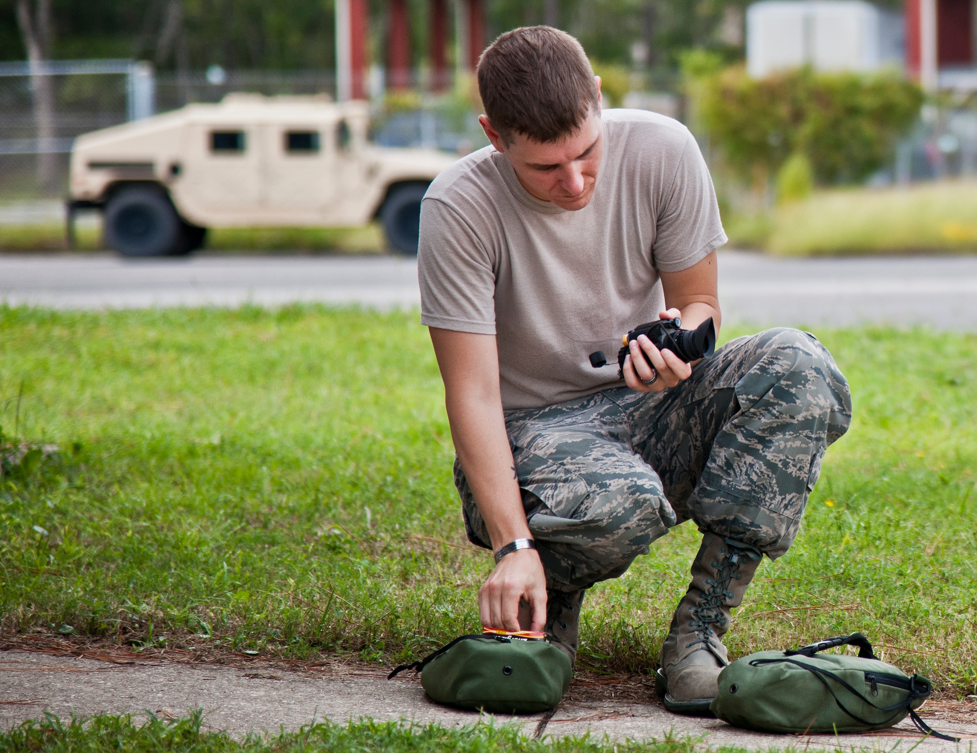 Staff Sgt. Donald Weitz, 96th Logistics Readiness Squadron vehicle operations, loads batteries into a set of night vision goggles prior to a combat operational readiness training exercise Oct. 3 at Eglin Air Force Base, Fla.  The training is an every-two-year requirement for all vehicle operations Airmen.  More than 20 completed the convoy operations missions that included inspections, attack scenarios and a medical evacuation.  (U.S. Air Force photo/Samuel King Jr.)