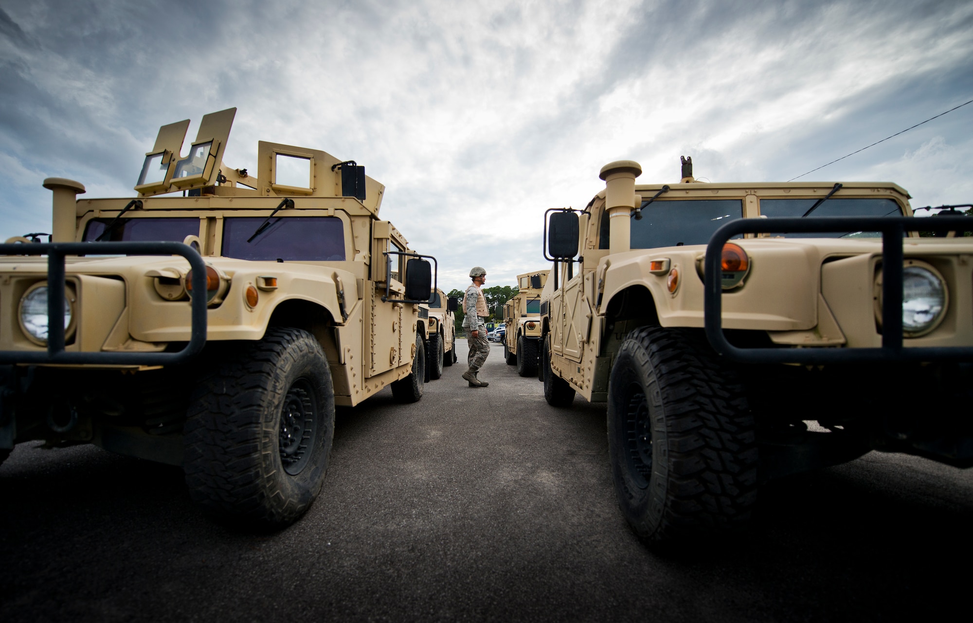 Senior Airman Shane Zimmerman, 96th Logistics Readiness Squadron vehicle operations, walks toward his HMMWV prior to a combat operational readiness training exercise Oct. 3 at Eglin Air Force Base, Fla.  The training is an every-two-year requirement for all vehicle operations Airmen.  More than 20 completed the convoy operations missions that included inspections, attack scenarios and a medical evacuation.  (U.S. Air Force photo/Samuel King Jr.)