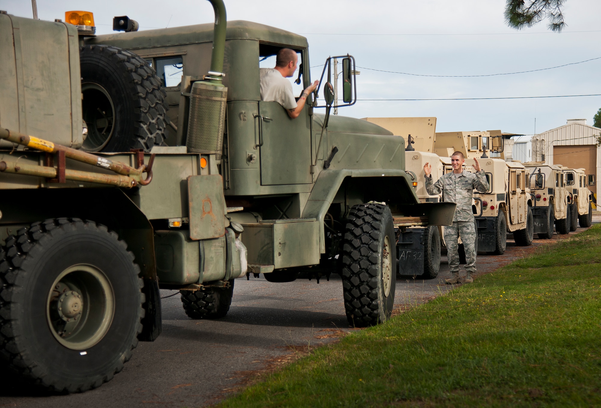 Senior Airman Christian Chilcoat, 96th Logistics Readiness Squadron vehicle operations, directs the wrecker into its spot in the convoy prior to a combat operational readiness training exercise Oct. 3 at Eglin Air Force Base, Fla.  The training is an every-two-year requirement for all vehicle operations Airmen.  More than 20 completed the convoy operations missions that included inspections, attack scenarios and a medical evacuation.  (U.S. Air Force photo/Samuel King Jr.)