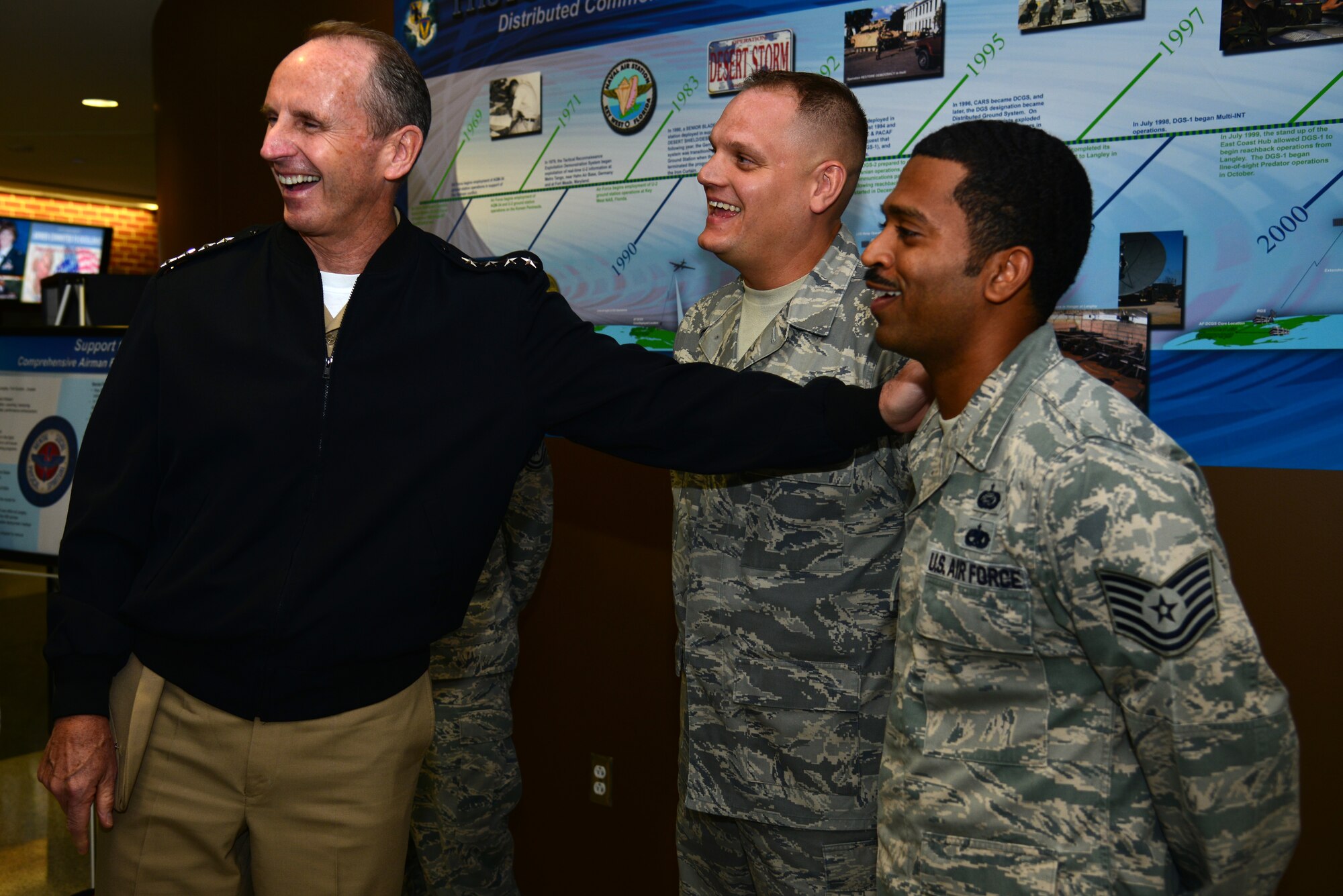 Chief of Naval Operations Adm. Jonathan Greenert recognized members of the 480th Intelligence, Surveillance and Reconnaissance Wing while visiting Langley Air Force Base, Va., Sept. 24, 2014. The analysts were acknowledged for their hard work and dedication to the ISR mission. (U.S. Air Force photo by Senior Airman Aubrey White/Released)