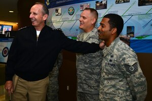 Chief of Naval Operations Adm. Jonathan Greenert recognized members of the 480th Intelligence, Surveillance and Reconnaissance Wing while visiting Langley Air Force Base, Va., Sept. 24, 2014. The analysts were acknowledged for their hard work and dedication to the ISR mission. (U.S. Air Force photo by Senior Airman Aubrey White/Released)
