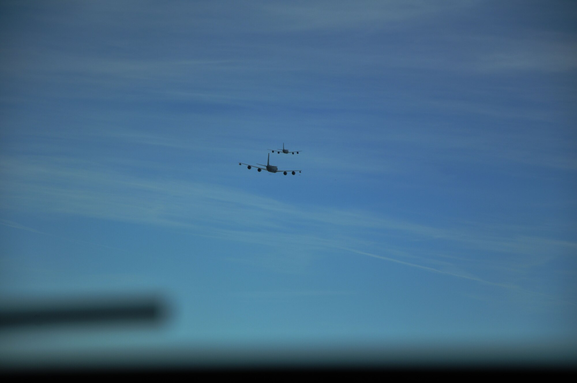 Two KC-135 Stratotankers assigned to McConnell Air Force base fly in formation Oct. 4, 2014.  Members of the 931st Aircraft Maintenance Squadron and 931st Operations Supports Squadron successfully launched nine KC-135s in thirty-second intervals during the October Unit Training Assembly.  (U.S. Air Force photo by Staff Sgt. Abigail Klein)