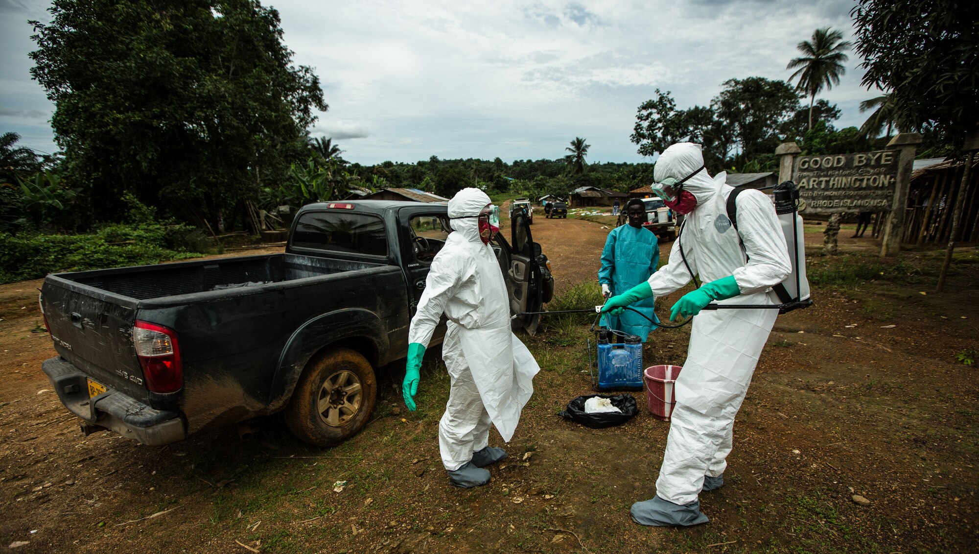 A USAID safe-burial team trained to handle the bodies of those infected with Ebola works in Monrovia, Liberia, Sept. 26, 2014. (USAID photo by Morgana Wingard)
