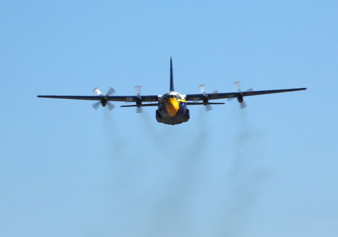 The Navy Blue Angels C-130 flies in for thousands of people during the 2014 Marine Corps Air Station Miramar Air Show, Oct. 3. The C-130 is known as "Fat Albert" and is flown by an all-Marine crew.
