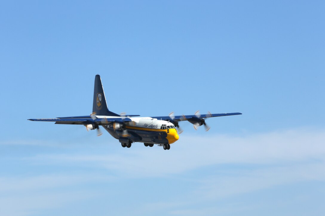 The Navy Blue Angels C-130 flies in for thousands of people during the 2014 Marine Corps Air Station Miramar Air Show, Oct. 3. The C-130 is known as "Fat Albert" and is flown by an all-Marine crew.