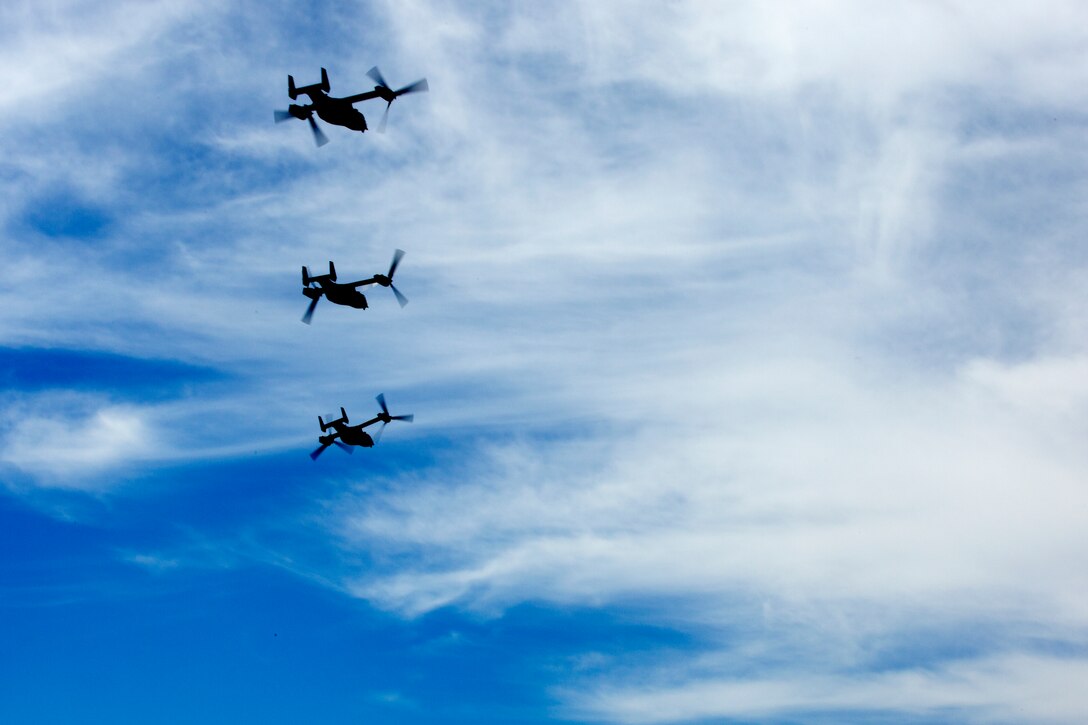 MV-22B Ospreys fly in formation during the Marine Air-Ground Task Force demonstration at the 2014 Miramar Air Show on the flight line aboard Marine Corps Air Station Miramar, Calif., Oct. 3. The air show celebrated 101 years of the MAGTF through sharing the mobile force’s capabilities to the public.