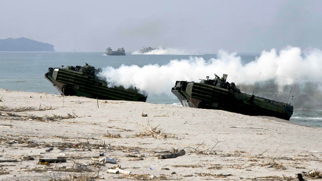 Philippine and U.S. Marines loaded in U.S. Marine Amphibious Assault Vehicles hit the beach during a mechanized assault in Amphibious Landing Exercise 15 at Naval Education and Training Command, Zambales, Luzon, Philippines, Oct. 5. PHIBLEX is an annual, bilateral training exercise conducted by members of the Armed Forces of the Philippines alongside U.S Marine and Navy Forces focused on strengthening the partnership and relationships between the two nations across a range of military operations including disaster relief and complex expeditionary operations. The U.S. Marines are with Company I, Battalion Landing Team 3rd Battalion, 5th Marines, 31st Marine Expeditionary Unit, 3rd Marine Expeditionary Brigade. The Philippine Marines are with 4th Marine Company, Battalion Landing Team - 9.
