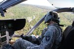 A Georgia National Guard member flies a LUH-72 while searching for marijuana near Polk County as the Governor’s Task Force/Drug Suppression (GTF) concludes six months of direct support to local communities throughout the state. This year the GTF eradicated over 15,000 plants, worth over $30 million, keeping these drugs and the illicit activity that goes with it off of Georgia’s streets. The GTF’s last mission support was to Polk County where they found eight plants within 10 miles of their launch site. 