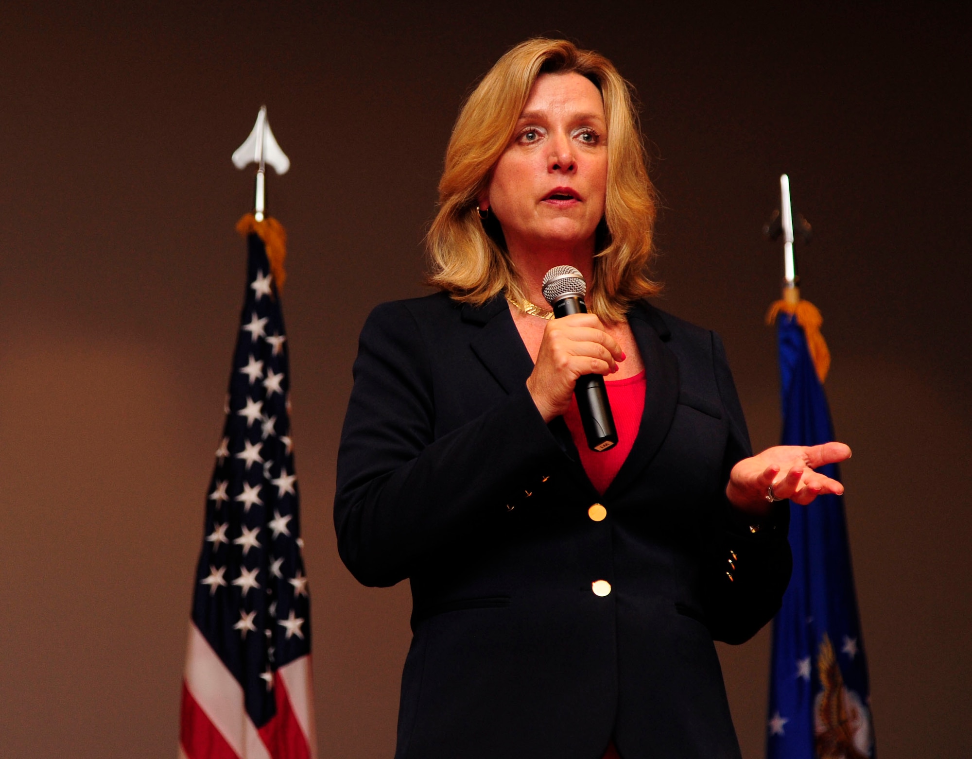 Secretary of the Air Force Deborah Lee James addresses an audience of more than 400 Airmen during an all call, Sept. 24, 2014, at Vandenberg Air Force Base, Calif. Her three-day visit included a launch operations tour at the Western Range Operations Control Center, a mission brief at the 381st Training Group, a tour of the Joint Space Operations Center and a breakfast with Airmen. (U.S. Air Force photo/Tech. Sgt. Tyrona Lawson)