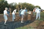 Volunteers creating Playscape at Lake Red Rock