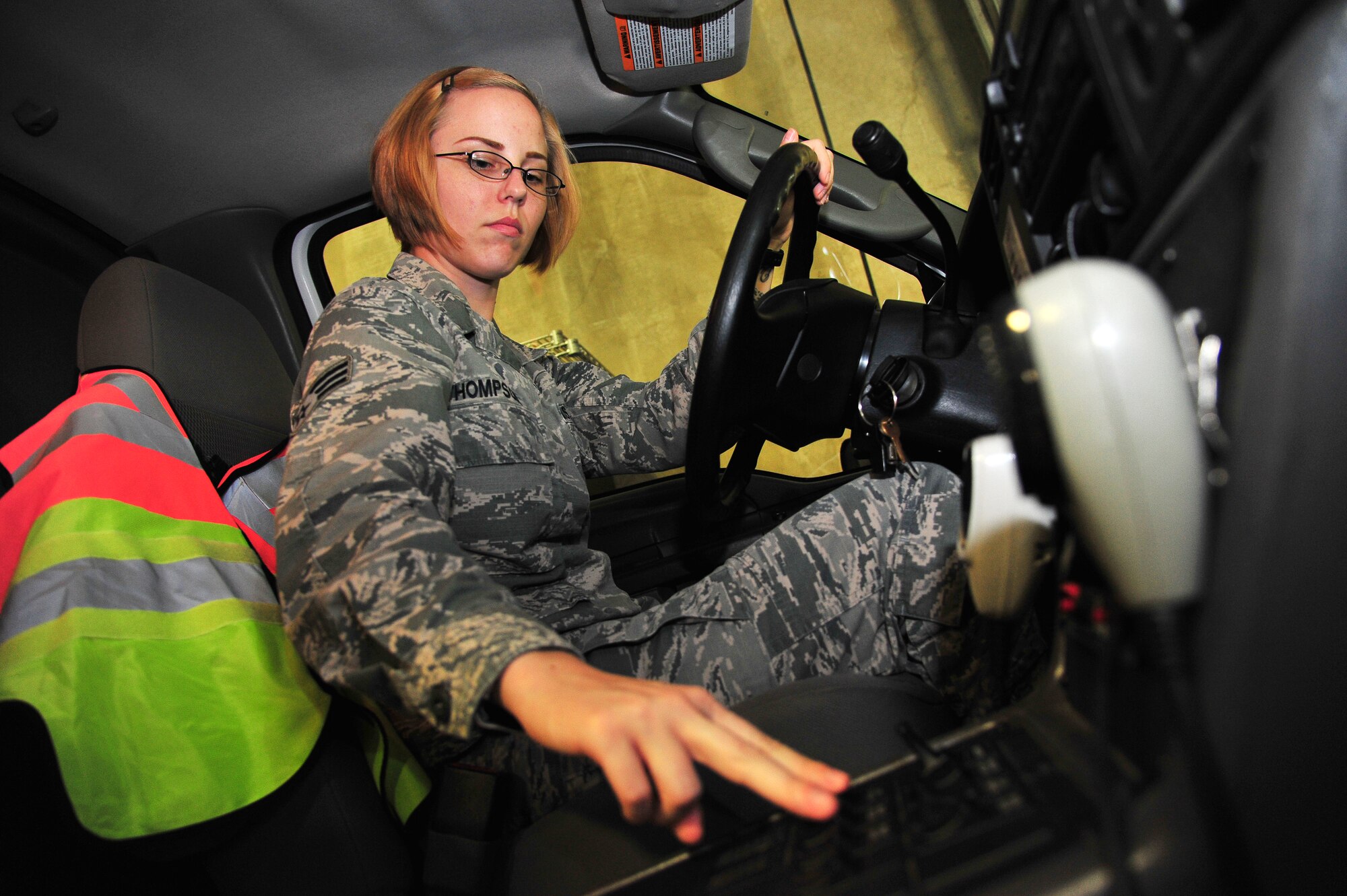 U.S. Air Force Senior Airman Dominique Thompson, 35th Aerospace Medicine Squadron aerospace medical service technician, readies ambulance sirens at Misawa Air Base, Japan, Oct. 1, 2014. Part of her job includes responding to in-flight and ground medical emergencies. (U.S. Air Force photo by Senior Airman Jose L. Hernandez-Domitilo)
